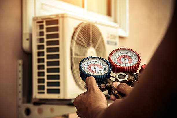 Professional Heat Pump Repair technician working in Woodbine, MD